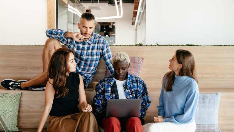 a group of people sitting on a couch