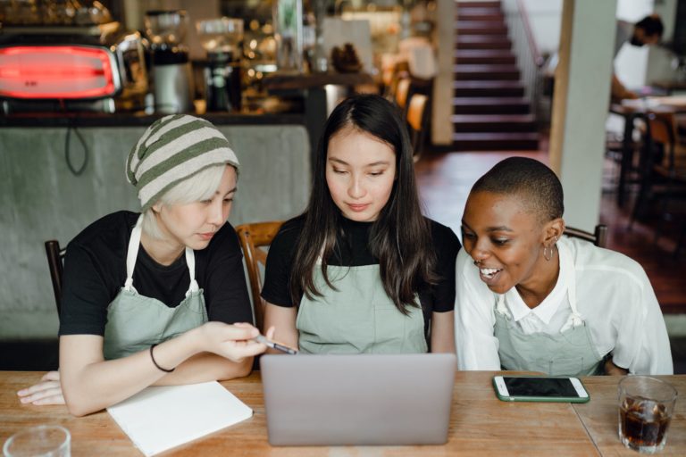 a group of people sitting at a table