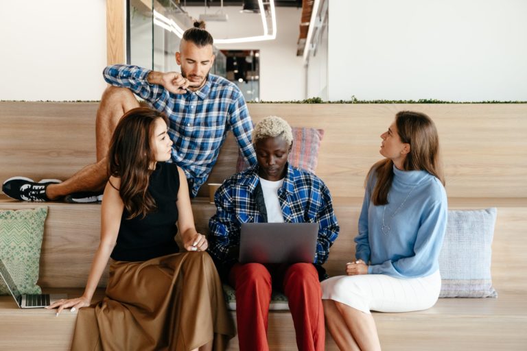 a group of people sitting on a couch