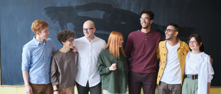 a group of people posing for a photo