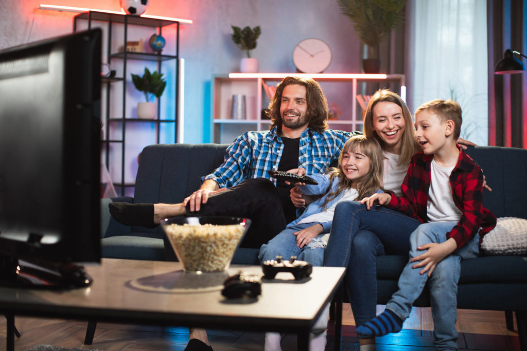 a group of people sitting on a couch