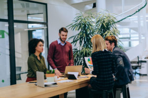 a group of people in an office